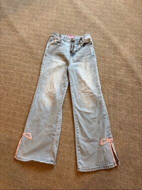 Girls size 12 Flared Jeans with Pink Bow Trim- worn once